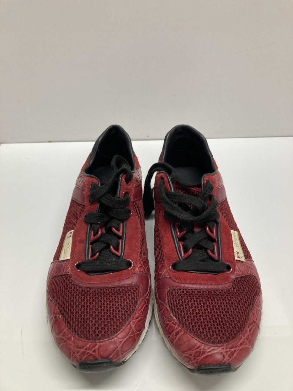 Lot 295  
            Edinburgh SR20 - Delivery Only 

                
GUCCI VINTAGE CROCO-EMBOSSED LOW-TOP SNEAKERS IN RED LEATHER AND MESH NO SIZE: LO...