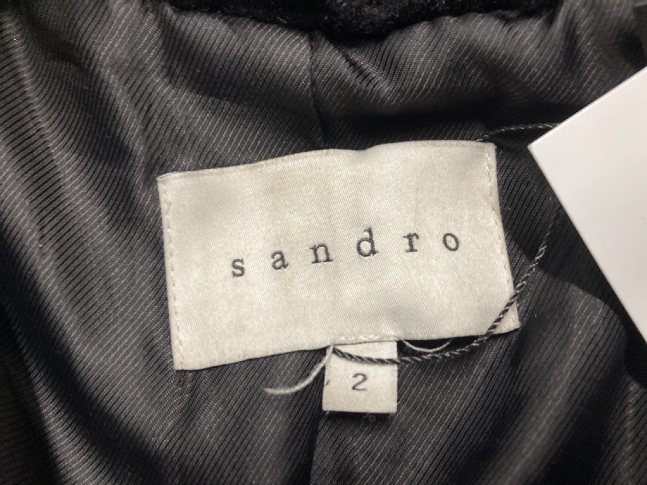 Lot 299  
            Edinburgh SR20 - Delivery Only 

                
SANDRO PARIS FAUX FUR COAT IN BLACK ACRYLIC SIZE 2: LOCATION - RAIL 1