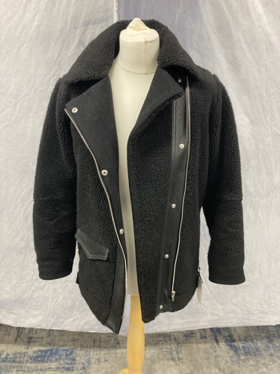Lot 300  
            Edinburgh SR20 - Delivery Only 

                
SANDRO PARIS SHEARLING BIKER COAT IN BLACK WOOL SIZE 36: LOCATION - RAIL 1