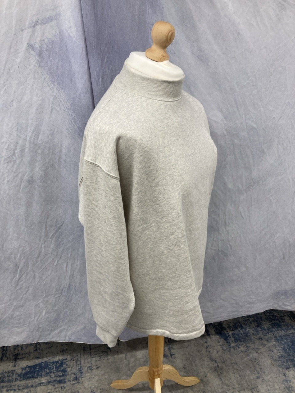 Lot 311  
            Edinburgh SR20 - Delivery Only 

                
FEAR OF GOD ESSENTIALS LOGO-FLOCKED JERSEY MOCK-NECK SWEATSHIRT IN CREAM COTTON S...