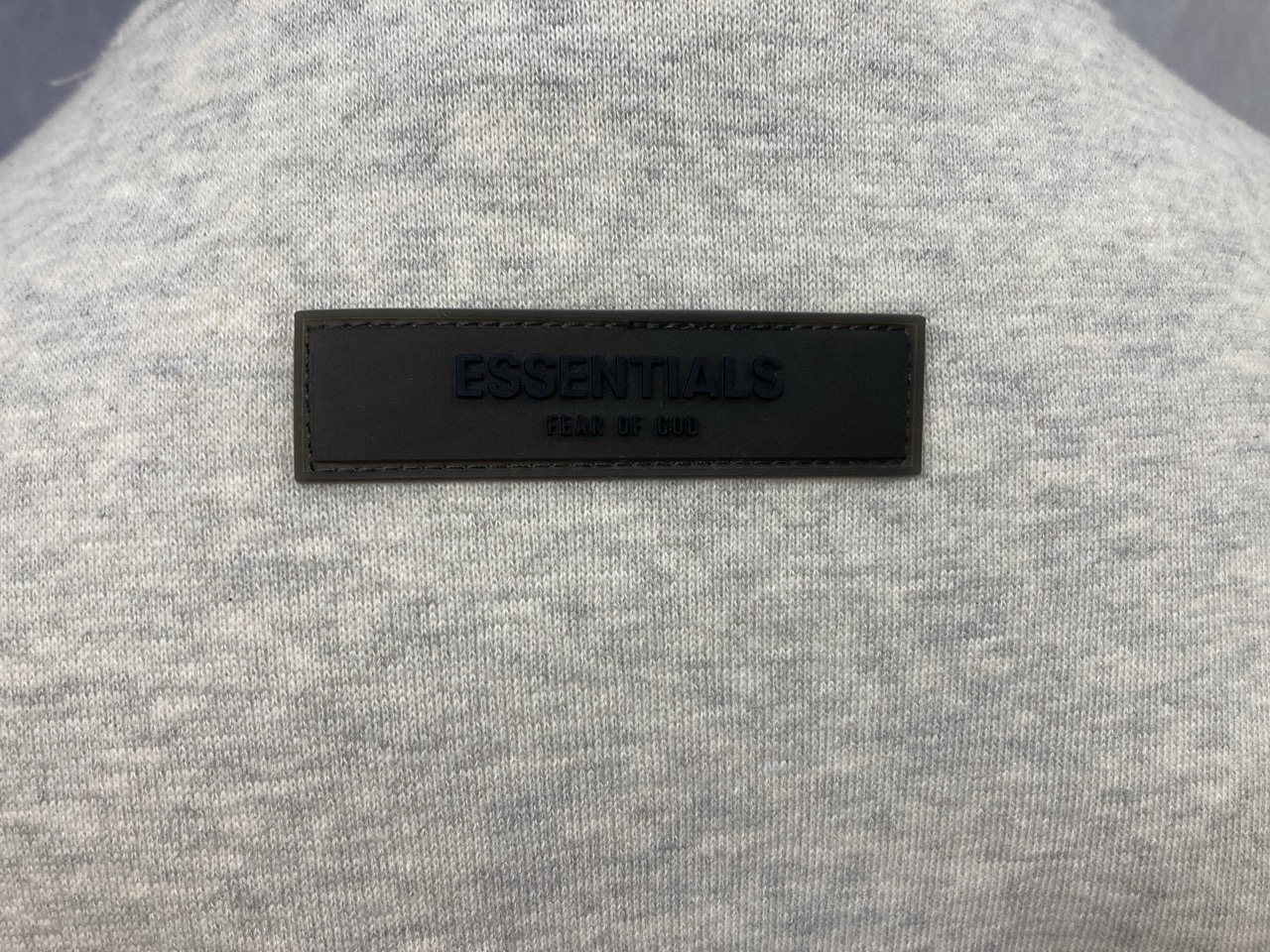 Lot 311  
            Edinburgh SR20 - Delivery Only 

                
FEAR OF GOD ESSENTIALS LOGO-FLOCKED JERSEY MOCK-NECK SWEATSHIRT IN CREAM COTTON S...