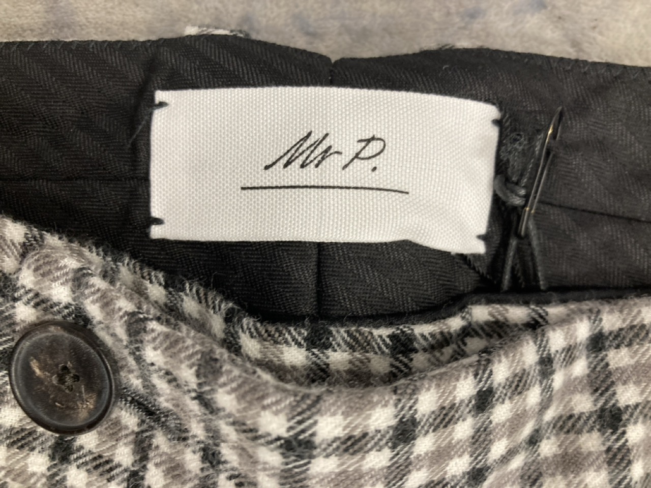 Lot 312  
            Edinburgh SR20 - Delivery Only 

                
MR. P CHECK TAPERED TROUSERS IN GRAY WOOL SIZE 34: LOCATION - RAIL 1