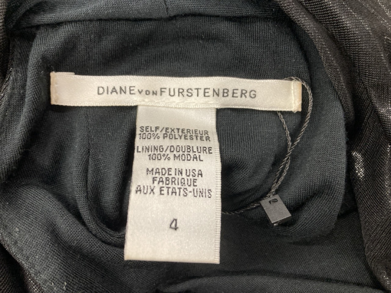 Lot 319  
            Edinburgh SR20 - Delivery Only 

                
DIANE VON FURSTENBERG MINI COWL NECK DRESS IN BLACK POLYESTER SIZE 4: LOCATION - ...