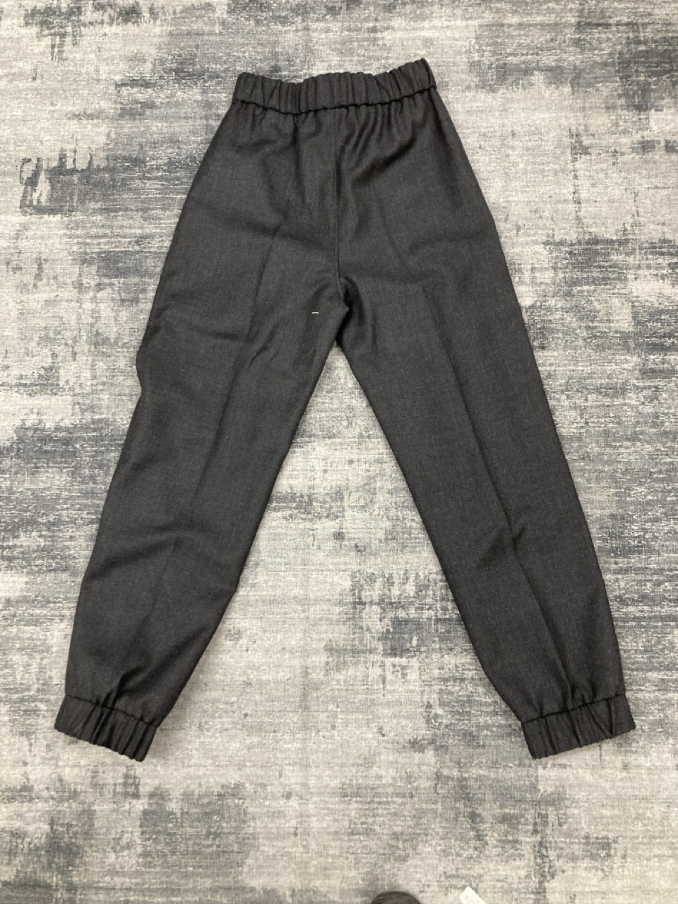 Lot 322  
            Edinburgh SR20 - Delivery Only 

                
GANNI CUFFED PANTS IN BLACK WOOL SIZE 36: LOCATION - RAIL 1