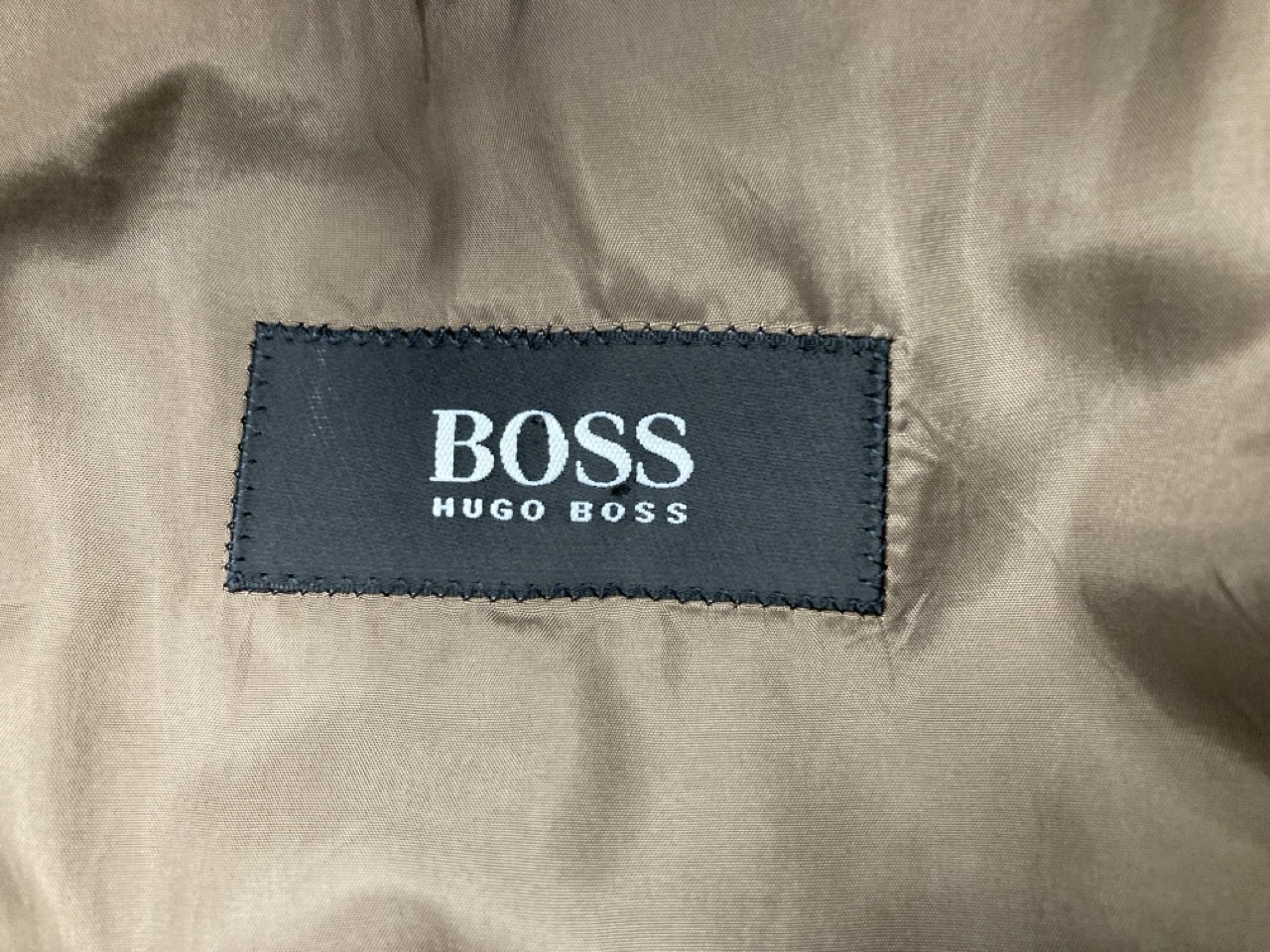 Lot 327  
            Edinburgh SR20 - Delivery Only 

                
BOSS BY HUGO BOSS BLAZER IN BROWN WOOL NO SIZE : LOCATION - RAIL 1