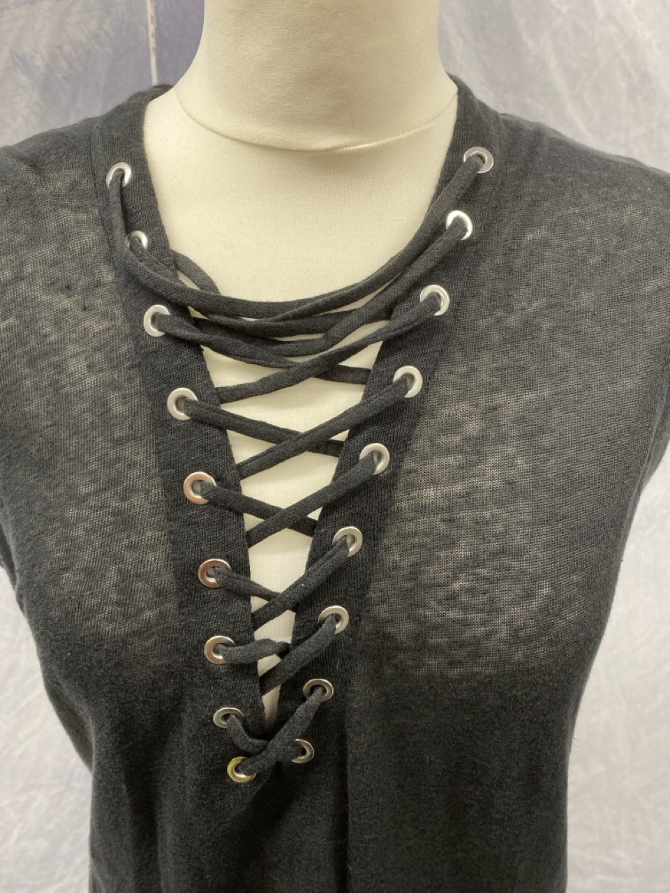 Lot 60  
            Edinburgh SR20 - Delivery Only 

                
IRO TISSA SLUB LACE-UP TOP IN BLACK LINEN SIZE S: LOCATION - RAIL 3