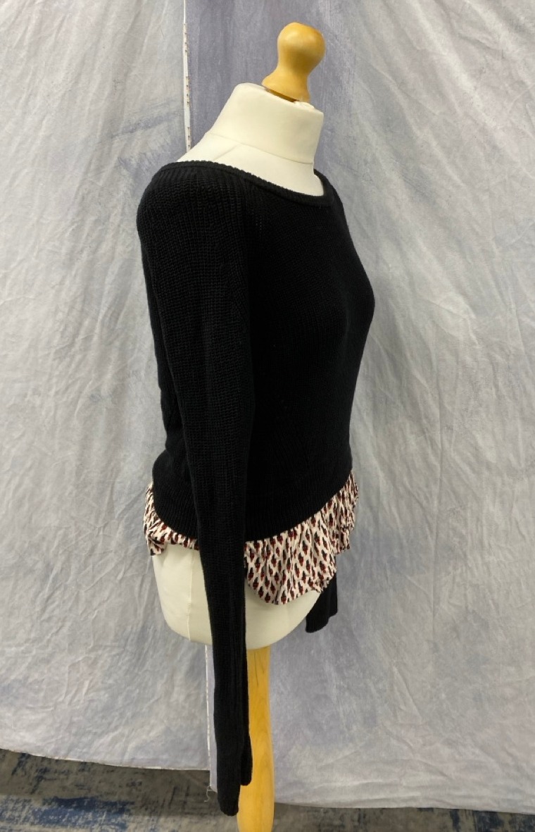 Lot 69  
            Edinburgh SR20 - Delivery Only 

                
MAJE RUFFLED HEM SWEATER IN BLACK COTTON LINEN NO SIZE : LOCATION - RAIL 3