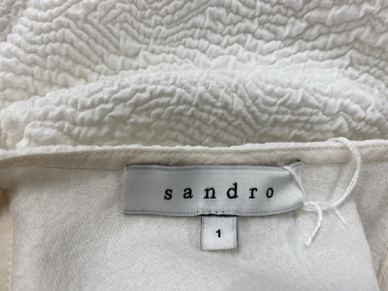 Lot 71  
            Edinburgh SR20 - Delivery Only 

                
SANDRO PARIS SLEEVELESS TOP IN WHITE POLYESTER VISCOSE SIZE 1: LOCATION - RAIL 3