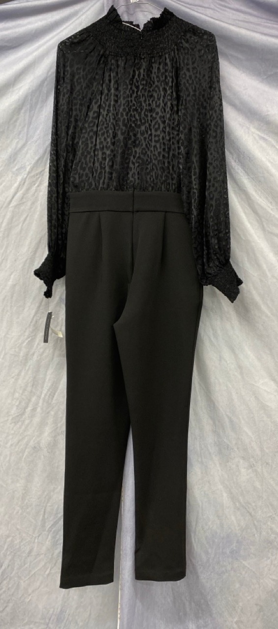 Lot 79  
            Edinburgh SR20 - Delivery Only 

                
MICHAEL MICHAEL KORS LONG SLEEVE JUMPSUIT IN BLACK VISCOSE SIZE 2: LOCATION - RAIL 3