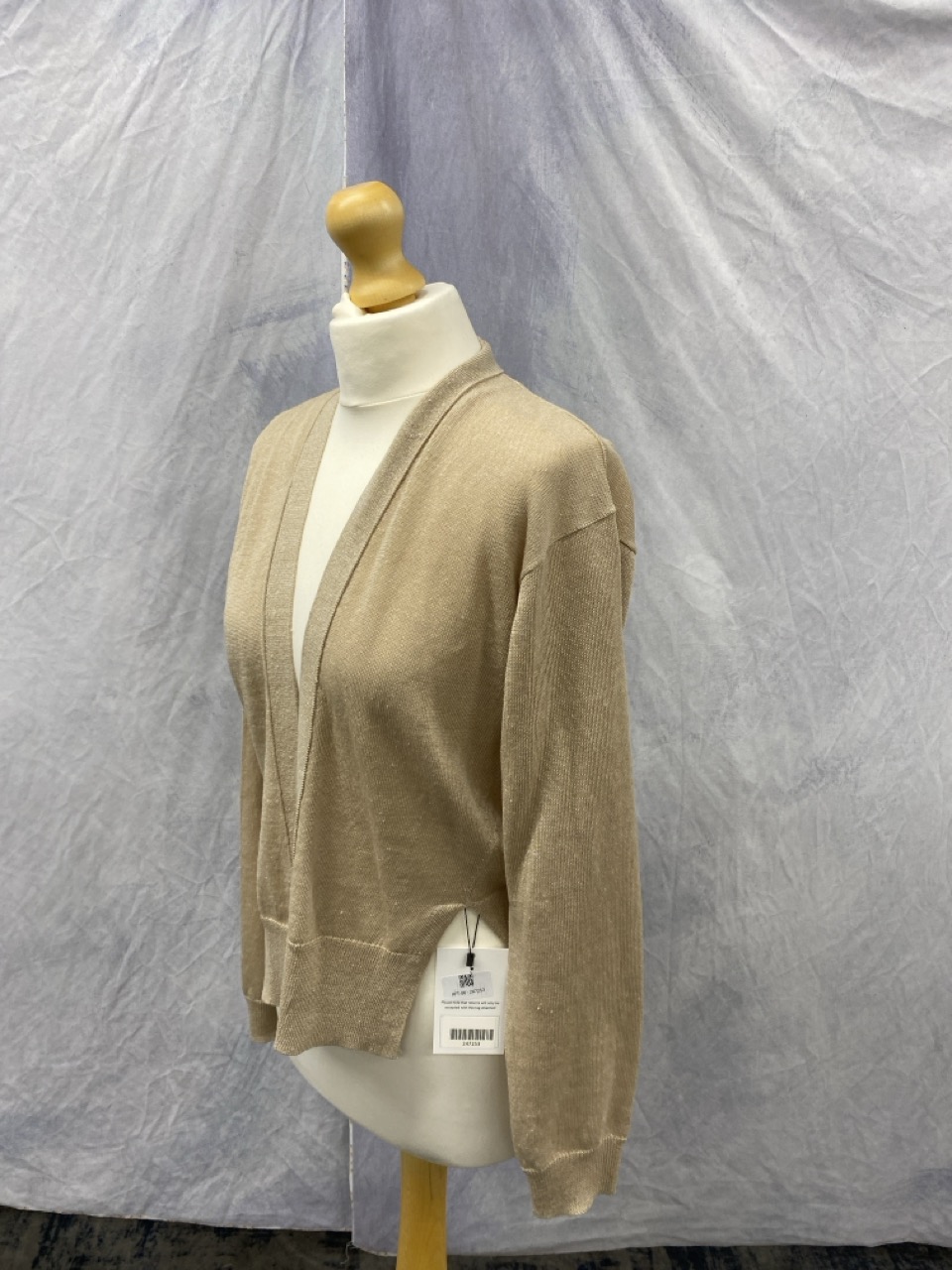 Lot 89  
            Edinburgh SR20 - Delivery Only 

                
VANESSA BRUNO OPEN FRONT CARDIGAN IN BEIGE LINEN SIZE XS: LOCATION - RAIL 3
