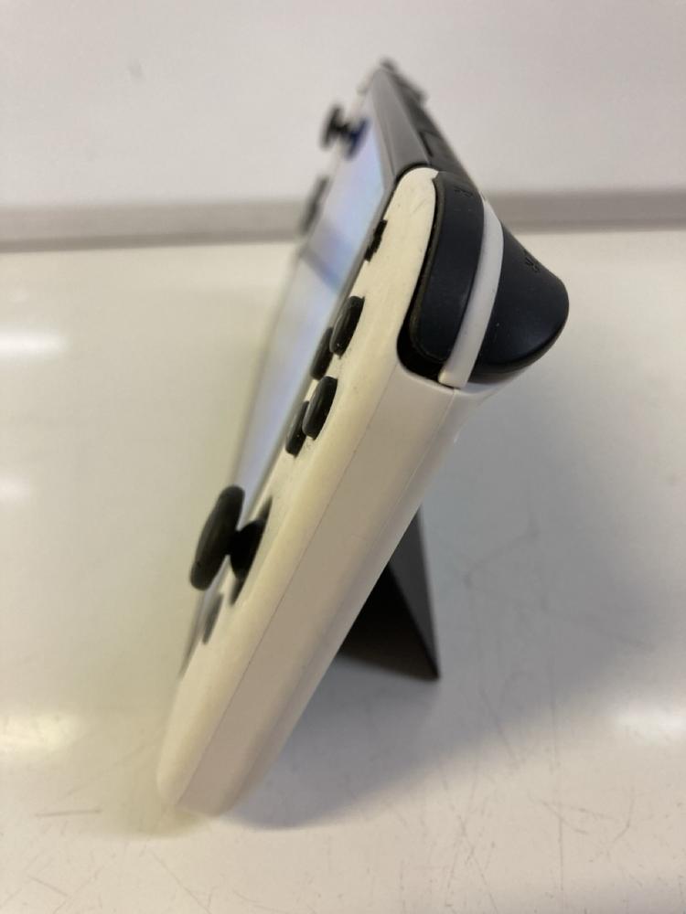 Lot 20  
            Birmingham Premium - Parcel Delivery Only 

                
NINTENDO SWITCH | OLED HANDHELD GAMES CONSOLE (ORIGINAL RRP - £299) IN WHITE. (BO... - Image 3