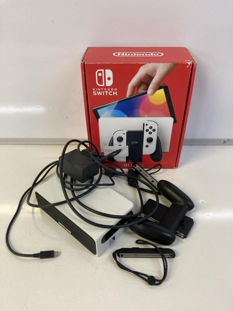 Lot 20  
            Birmingham Premium - Parcel Delivery Only 

                
NINTENDO SWITCH | OLED HANDHELD GAMES CONSOLE (ORIGINAL RRP - £299) IN WHITE. (BO... - Image 4