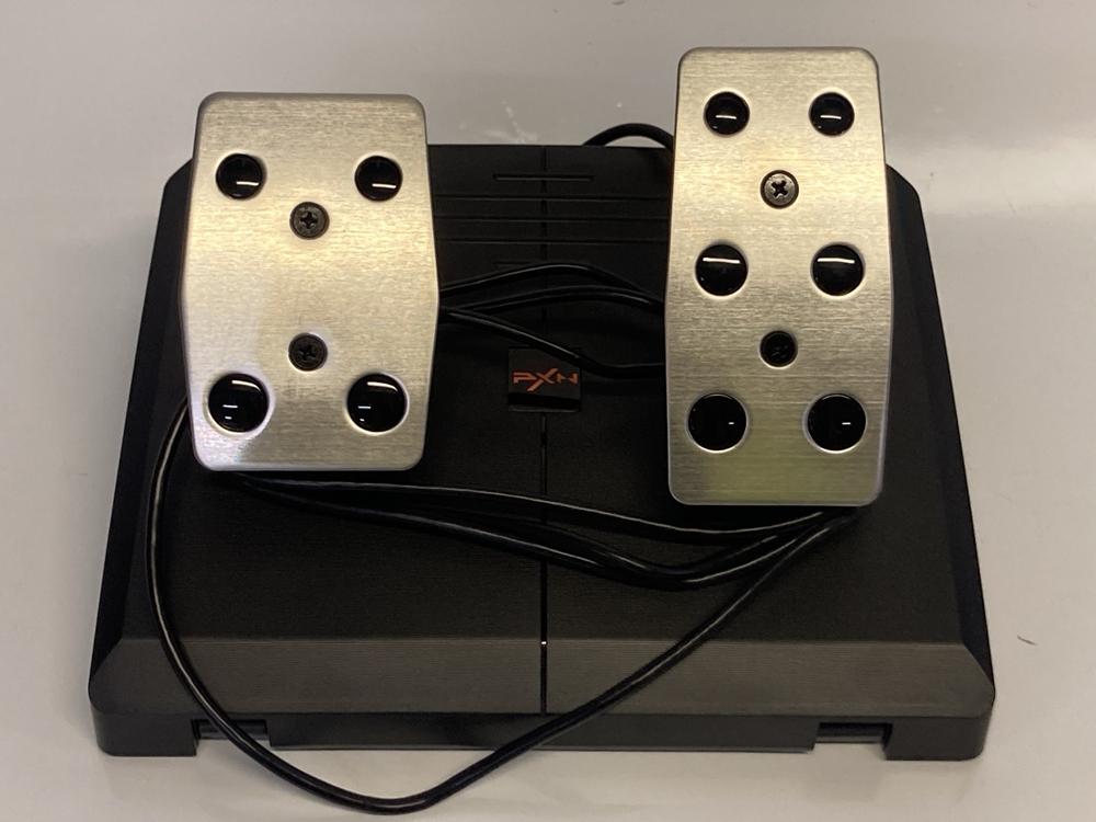 Lot 52  
            Birmingham Premium - Parcel Delivery Only 

                
RXN V900 GEN 2 X RACING WHEEL TO INCLUDE (ORIGINAL RRP - £200). (BOXED, POWER CAB... - Image 4